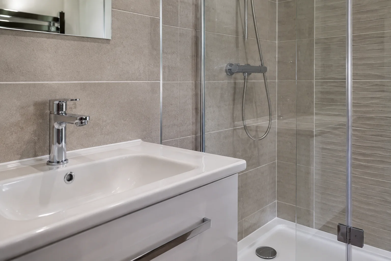 Bathroom after full limescale and grout treatment